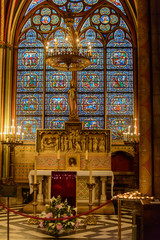Fototapeta na wymiar The interior of Notre-Dame Cathedral in Paris. Scenes from the life of Jesus Christ