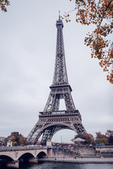 Fototapeta na wymiar Eiffel Tower, Paris on a misty autumn day
