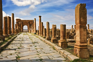 Algeria. Timgad (ancient Thamugadi or Thamugas). Decumanus Maximus street and surrounding colonnade...
