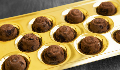 Chocolate pralines with cocoa powder