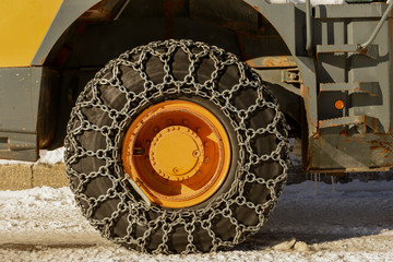 Tractor tires with chains in the snow