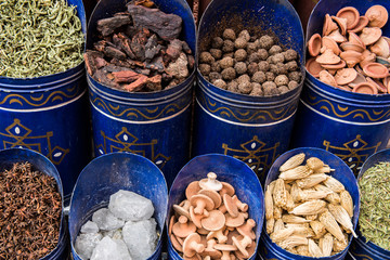Moroccan tea and Sandal wood for sale in the souk In Marrakesh