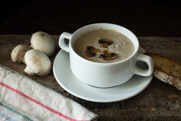 Creamy mushroom soup with slice of bread