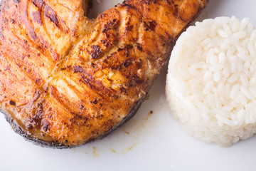 Grilled salmon steak with rice. Recipe background