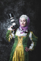 Medieval woman holds SLR camera