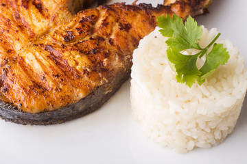 Grilled salmon steak with rice. Recipe background