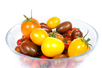 Fresh tomatoes on plate