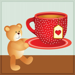 Teddy bear carrying cup of tea