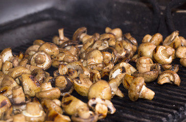 mushrooms grilling in the kitchen at the restaurant