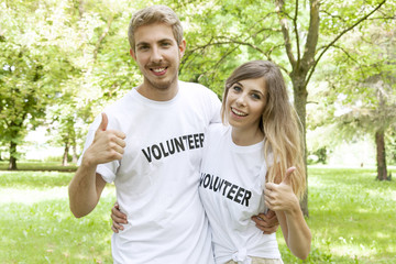 couple of teenagers volunteering