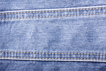 Blue jeans sew closeup texture.