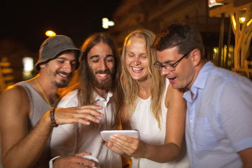 Friends looking at great shots of today evening