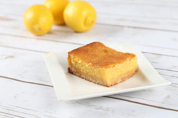 Slice of lemon pie. Lemon bar.