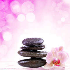 Beautiful composition with spa stones on light background, close up