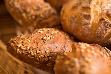 baskets of bread on a shelf, in a bakery store