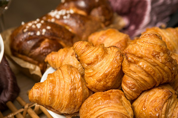 croissant plate on the table in a bakery store, ready to be served