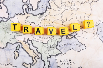 Travel as a question on World map background