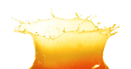 Fototapeta na wymiar Splashing orange juice isolated on white