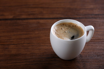 Cup of coffee on table close up