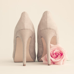 Vintage heel shoes and pink rose