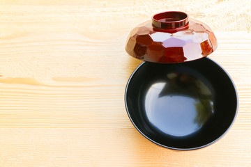 blank bowl on wooden background