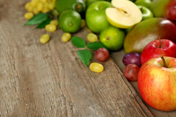 Fruits on wooden background