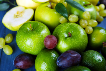 Fruits on dark blue wooden background