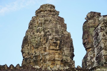 Ruins of the Bayon temple with its giant stone heads near Angkor, Cambodia