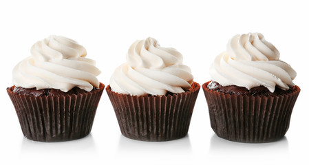Tasty cupcakes isolated on white background