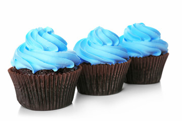 Delicious cupcakes isolated on white background
