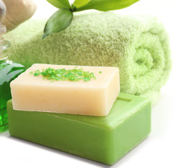 Spa set with exotic flower on white background, close up