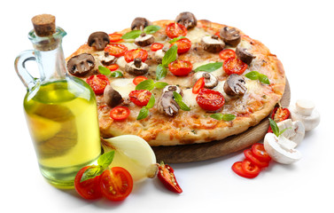 Tasty pizza and fresh vegetables on round wooden board, close up