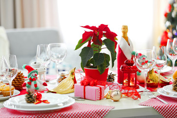 Christmas table setting on light room background