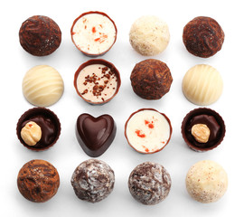 Assorted collection of chocolate candies and sweets, isolated on white