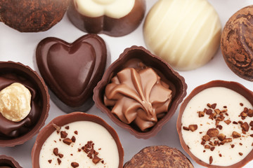 Background of assorted chocolate candies and sweets