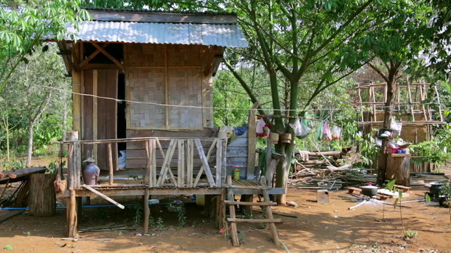 poor lao village houses in rural life, Laos