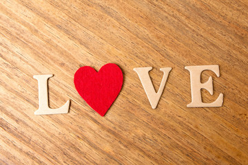 Valentine hearts on rustic wooden background