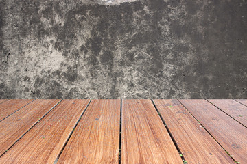 Top fo wood table on concrete wall background. you can be used for display your products
