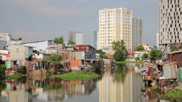Ho Chi Minh City slums by river, Saigon, Vietnam