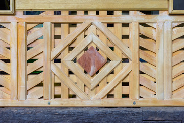 Yellow wooden fence.