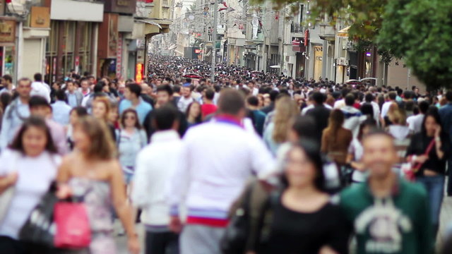 people walking in a crowded street