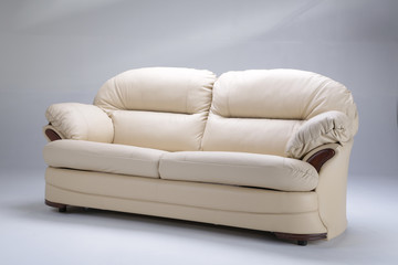 Leather white sofa on the white