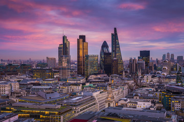 Skyline of Business district of London at dusk with beautiful colorful sky and Canary Wharf at the...