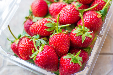 Fresh strawberry in plastic box