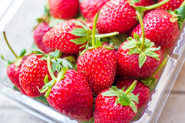 Fresh strawberry in plastic box