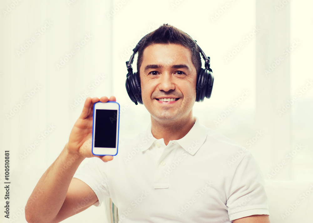 Sticker happy man with smartphone and headphones