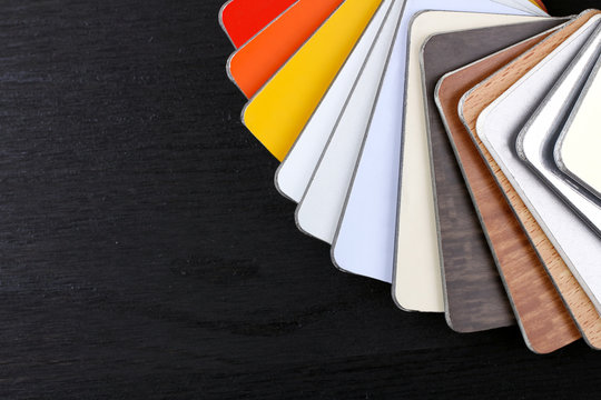 wooden color sample on a wooden black table