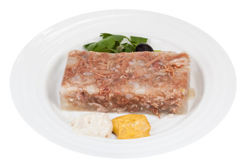 piece of meat aspic with seasonings on white plate