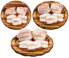 set of boards with hot smoked sturgeon isolated