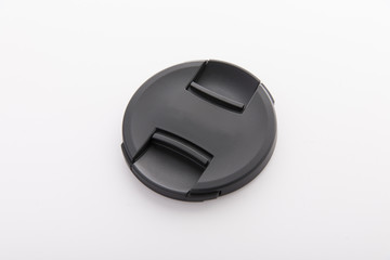 Lens cap on a white background